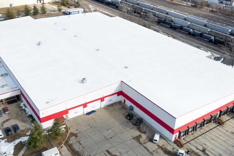Doll Distributing LLC commercial roof repair in Des Moines
